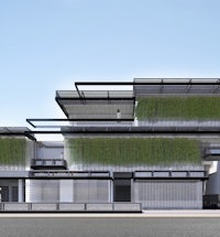 a rendering of a building with a green roof