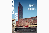 the cover of a magazine with an image of a building