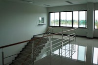 a white railing on a staircase