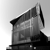 a black and white image of a building