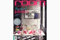 the cover of room magazine with a table and chairs